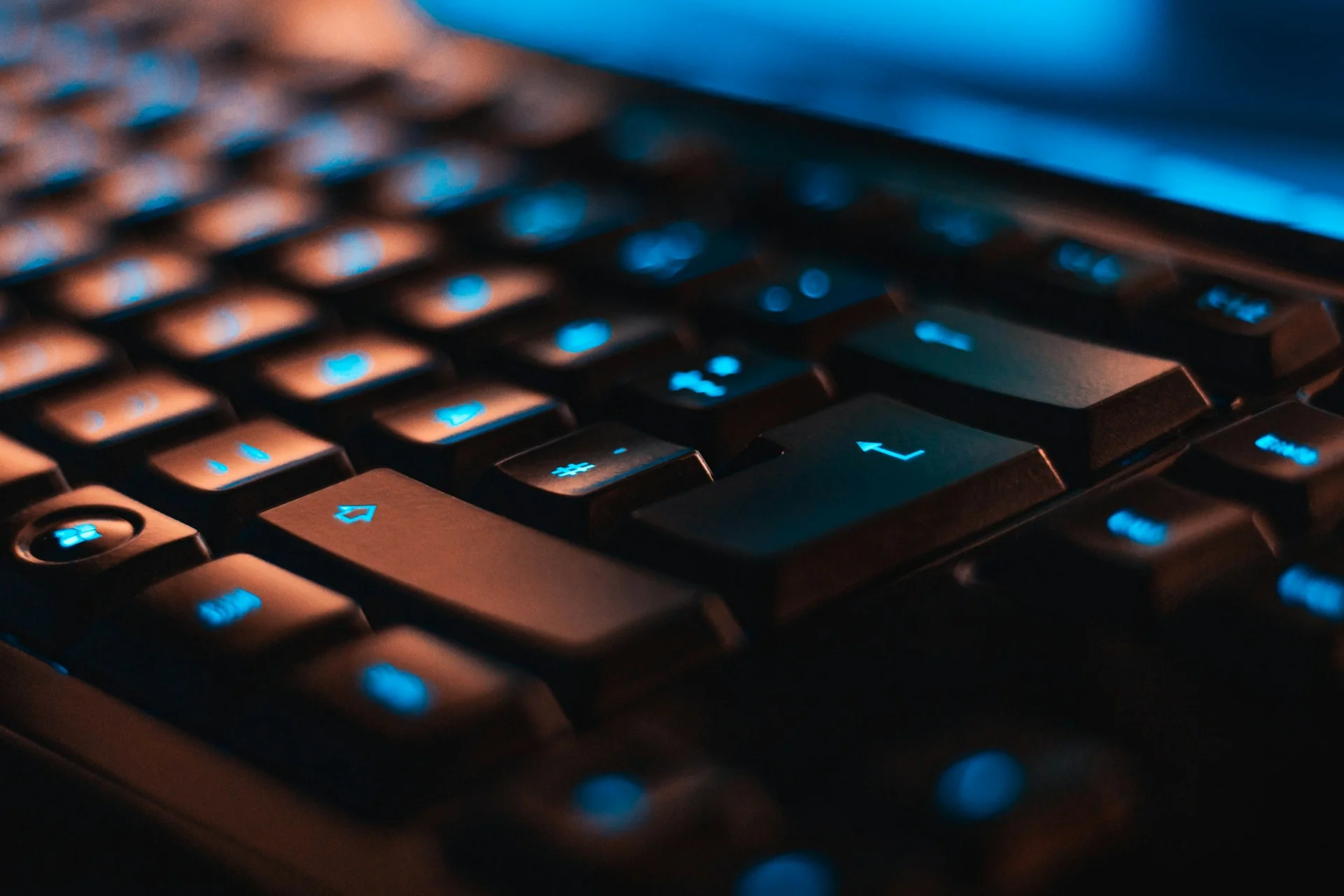a computer monitor with a security shield, a phishing hook, and warning icons, representing the increased digital risks associated with Windows Server 2016 end of support.