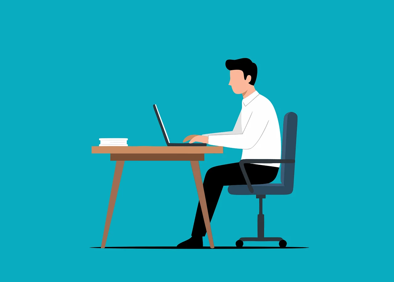 An illustration of a professional working at a laptop, representing the final desk-side tasks and knowledge transfer sessions required in an employee offboarding checklist.