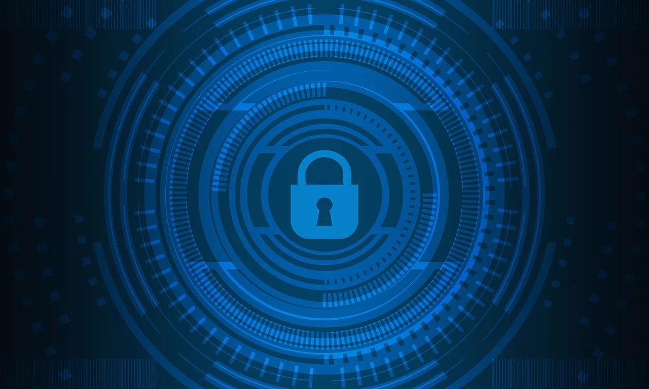 A glowing blue padlock icon centered within concentric digital data rings, representing the identity-centric core of a Zero Trust architecture for small business.